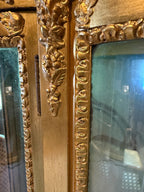 Victorian Wood Gilded Glass Display Cabinet Curved Glass Antique Showcase Shelves Gold Trimmed Curio Cherub Home Decor Elegant Accent Piece