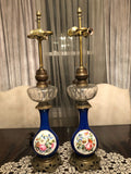 Pair Of Antique French Cobalt Blue Porcelain Table Lamps Hand Painted Floral Panels Ornate Brass Base Converted Electric Lighting Decor