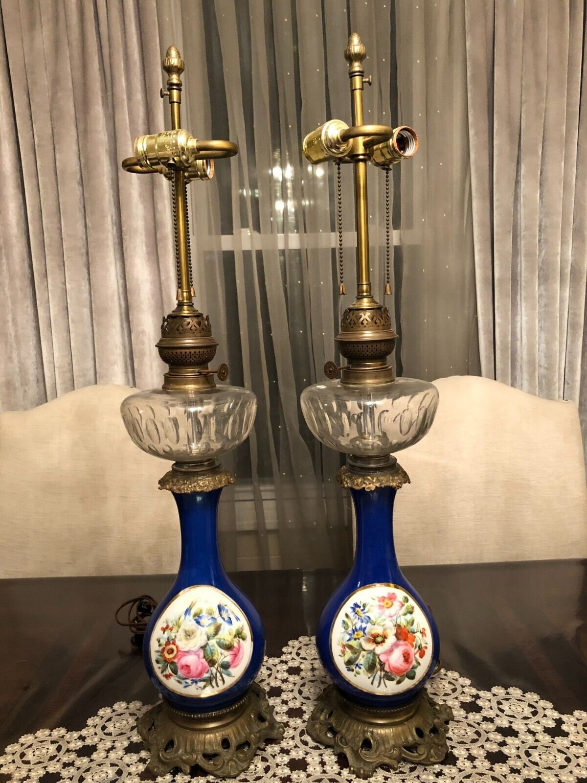 Pair Of Antique French Cobalt Blue Porcelain Table Lamps Hand Painted Floral Panels Ornate Brass Base Converted Electric Lighting Decor