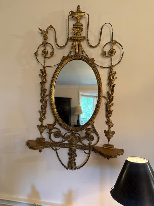 Antique French Wall Mirror 19th Century Oval Gilt Floral Wood Neoclassical Design Urn Garland Carvings Two Candle Shelves Luxurious Mirror
