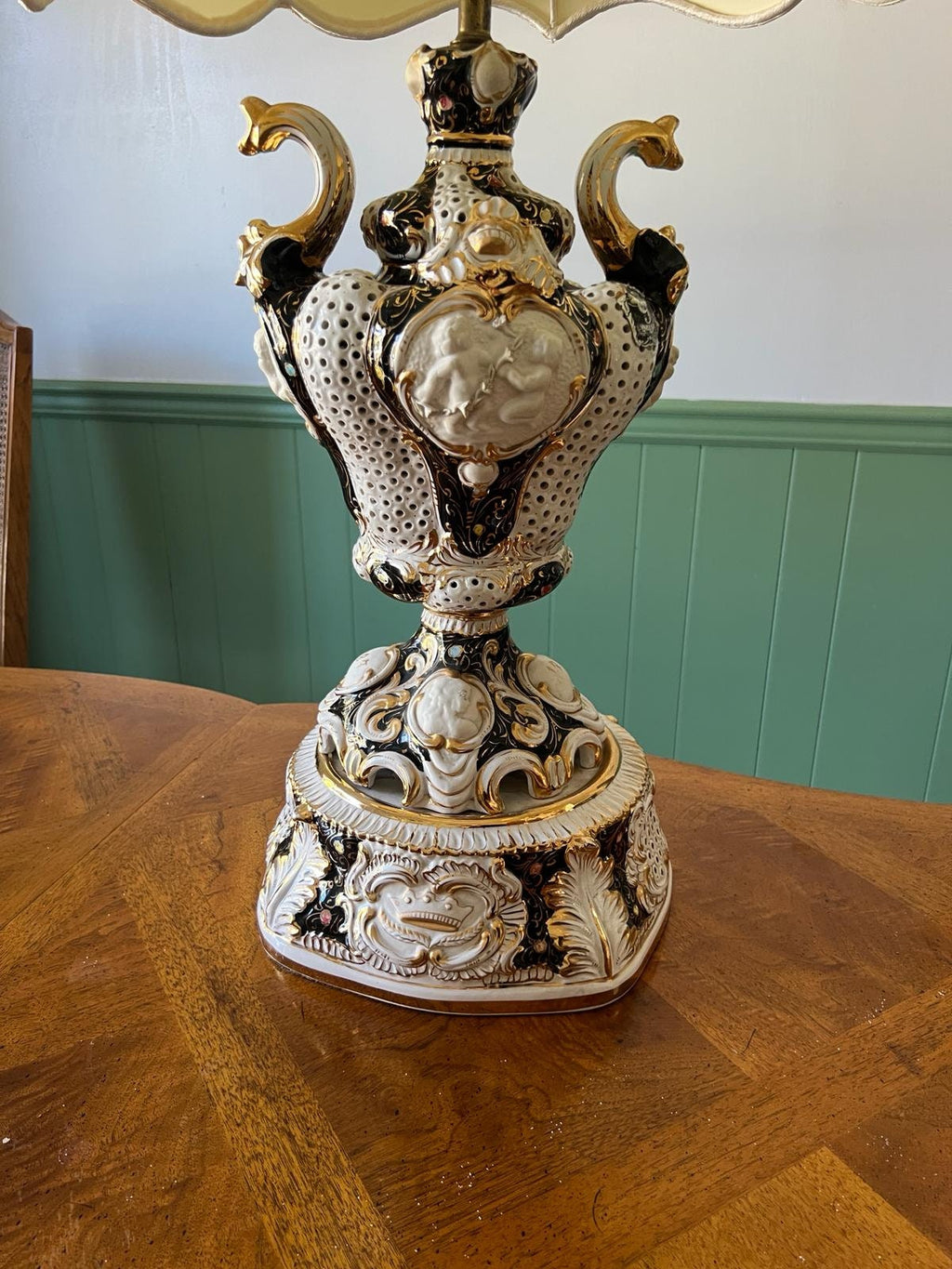 Baroque Porcelain Table Lamps Pair Ornate Cherub Motif Black White Gold Embellished Romantic Rococo Style Sculptural Lighting Decoration
