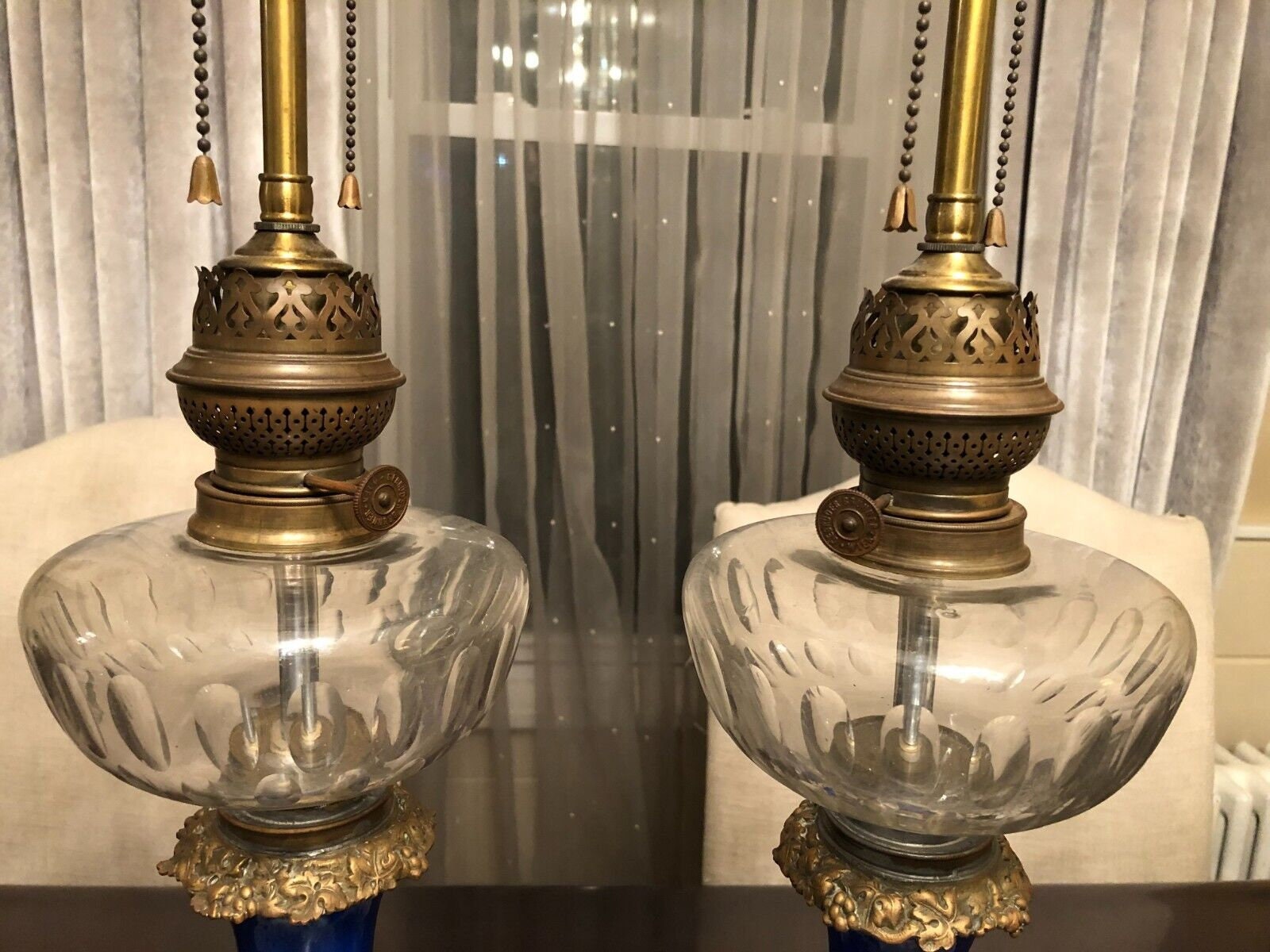 Pair Of Antique French Cobalt Blue Porcelain Table Lamps Hand Painted Floral Panels Ornate Brass Base Converted Electric Lighting Decor