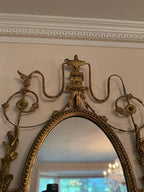 Antique French Wall Mirror 19th Century Oval Gilt Floral Wood Neoclassical Design Urn Garland Carvings Two Candle Shelves Luxurious Mirror
