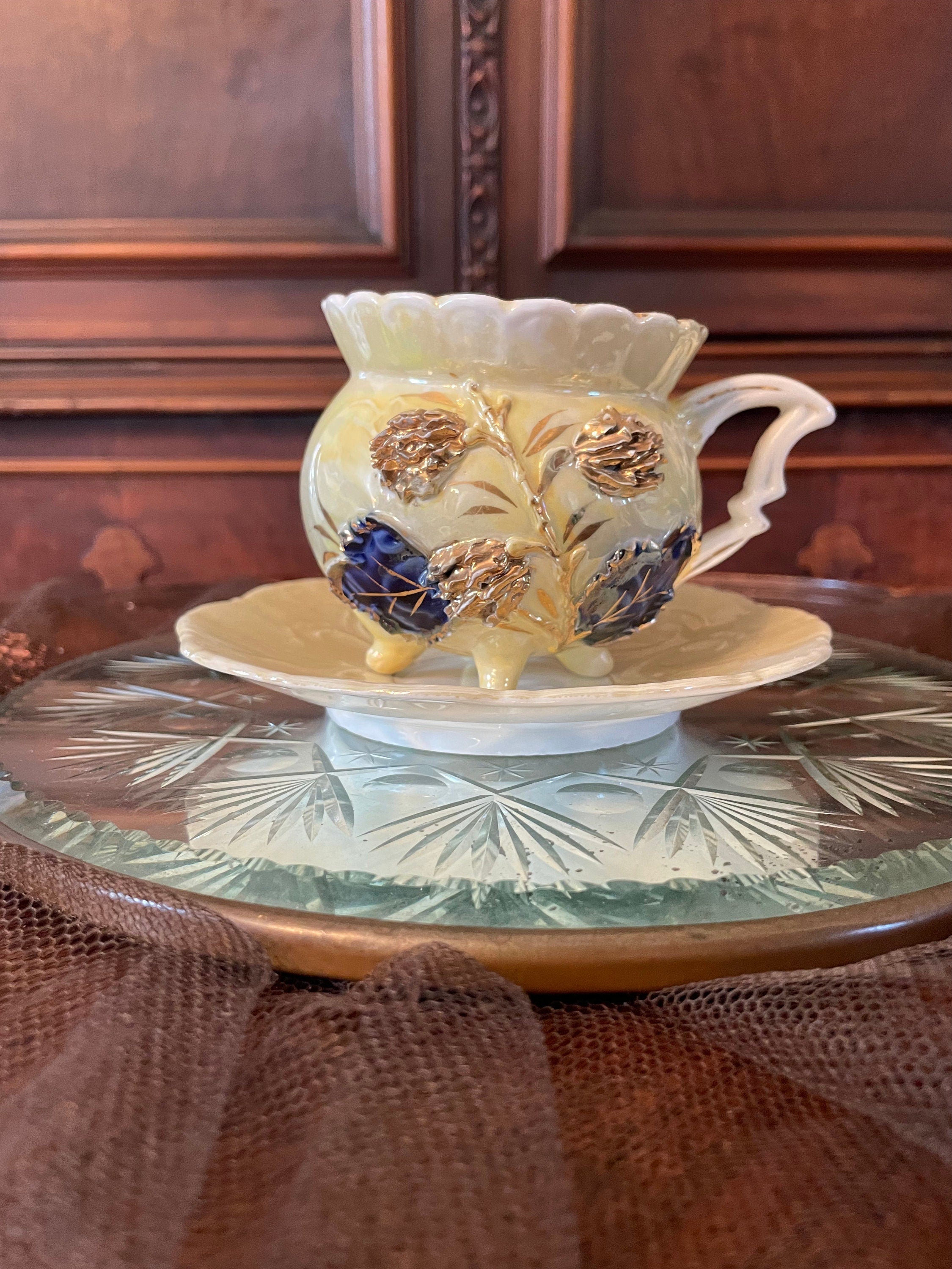 Antique Porcelain Floral Design Yellow Gold & Blue Teacup Saucer.