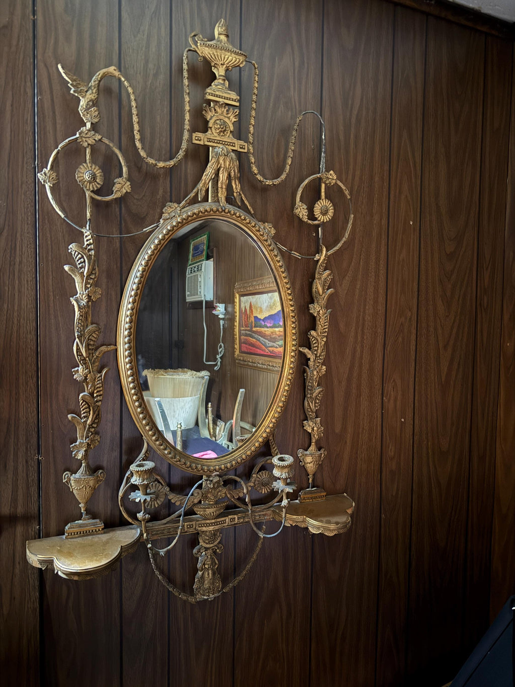 Antique French Wall Mirror 19th Century Oval Gilt Floral Wood Neoclassical Design Urn Garland Carvings Two Candle Shelves Luxurious Mirror