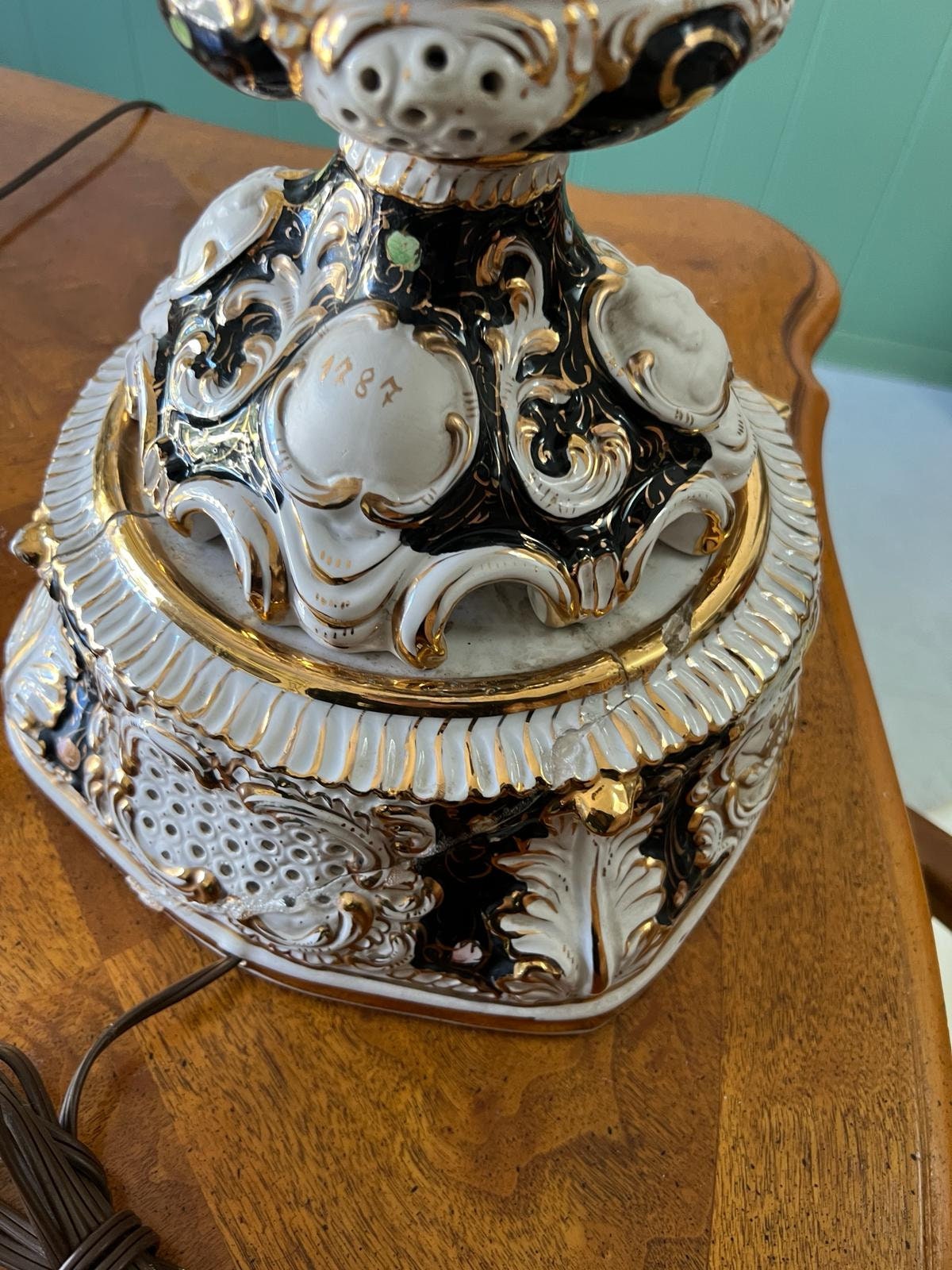 Baroque Porcelain Table Lamps Pair Ornate Cherub Motif Black White Gold Embellished Romantic Rococo Style Sculptural Lighting Decoration