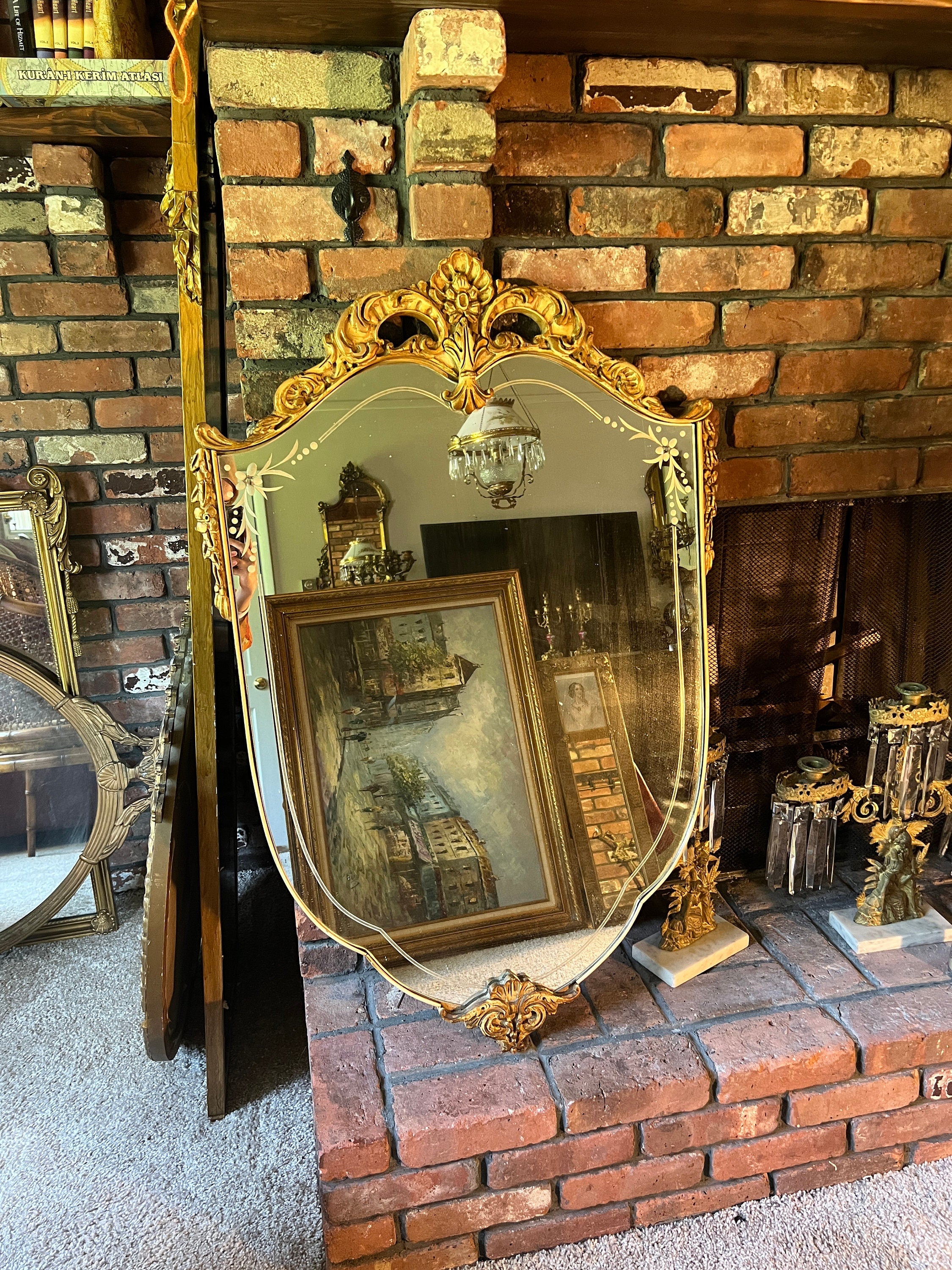 Antique Rococo Mirror Gold Gilt Shield Shape Ornate Carved Frame Beveled Glass Floral Detail Wall Decor French Vintage Statement Piece