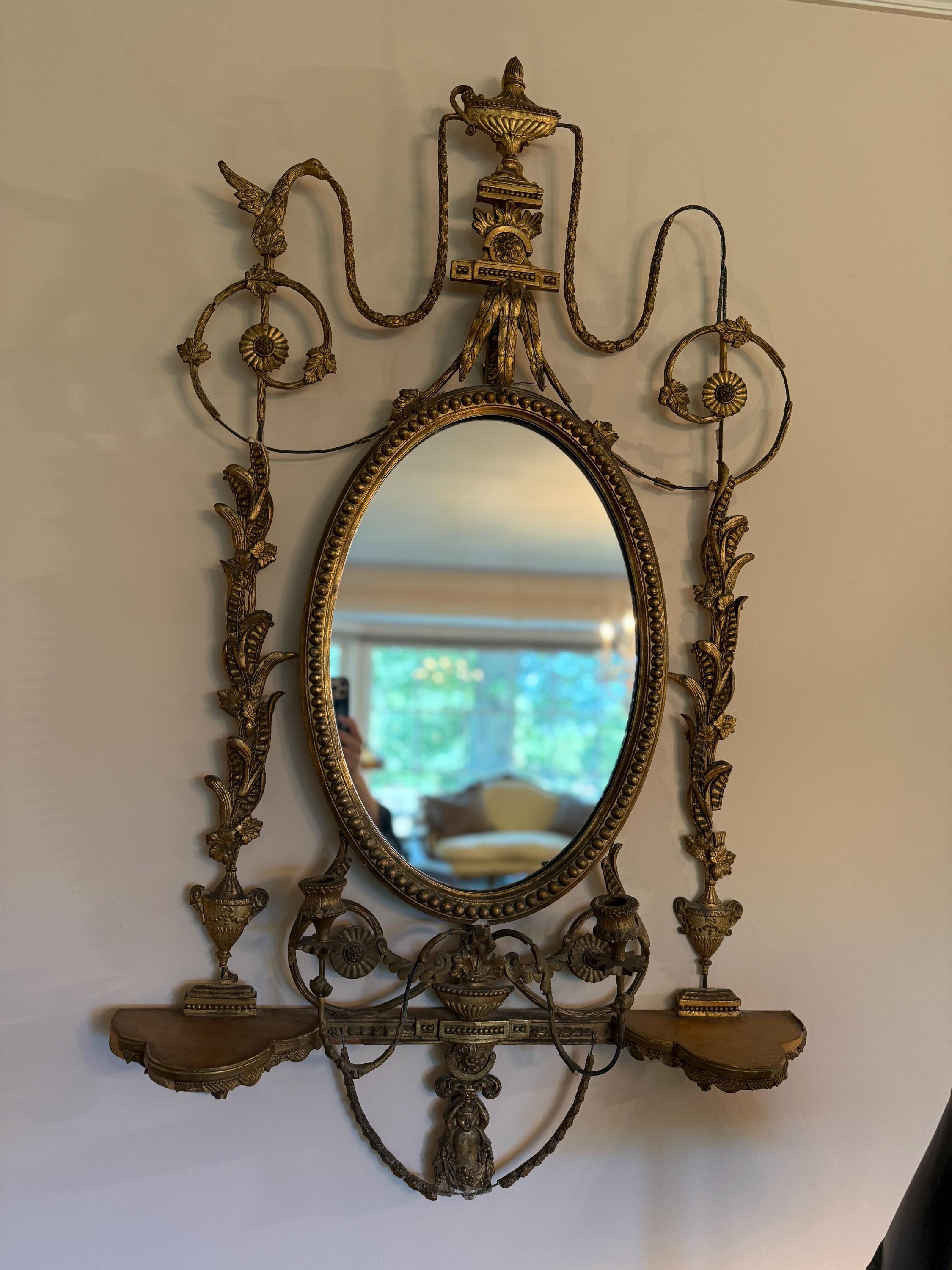 Antique French Wall Mirror 19th Century Oval Gilt Floral Wood Neoclassical Design Urn Garland Carvings Two Candle Shelves Luxurious Mirror