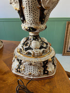 Baroque Porcelain Table Lamps Pair Ornate Cherub Motif Black White Gold Embellished Romantic Rococo Style Sculptural Lighting Decoration